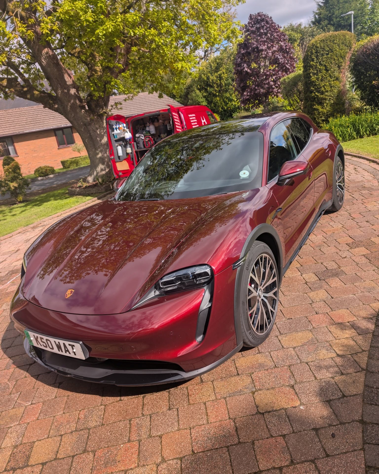 Red Porsche outside after detailing