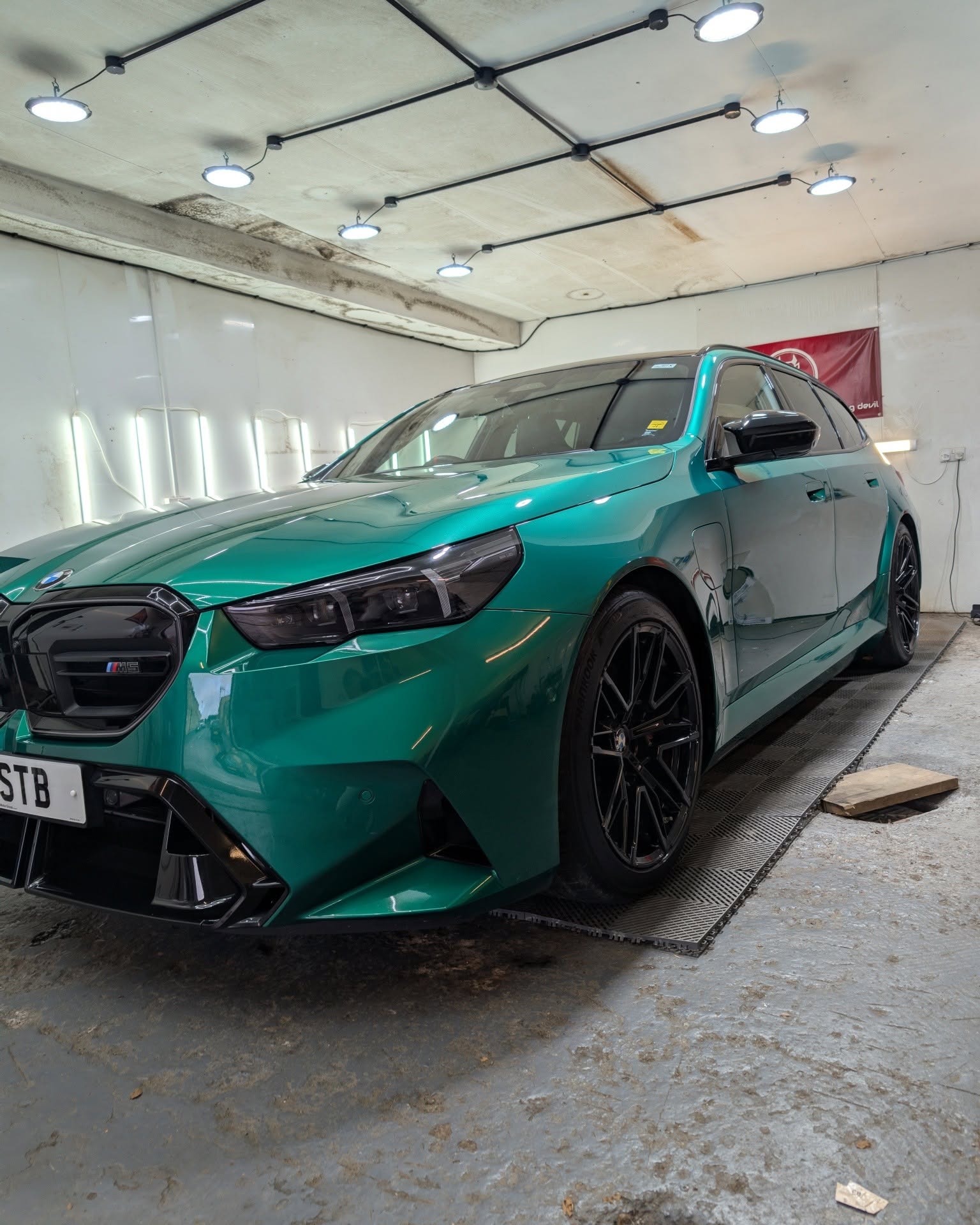Green BMW M5 in the studio