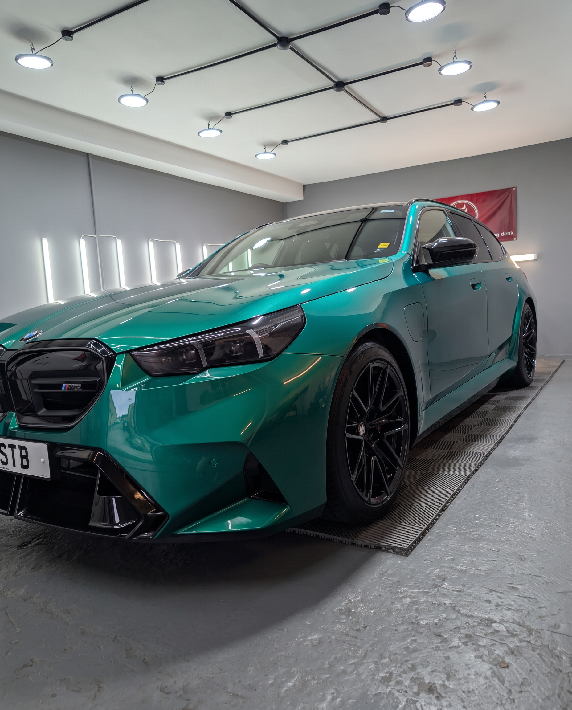 Green BMW M5 in the studio