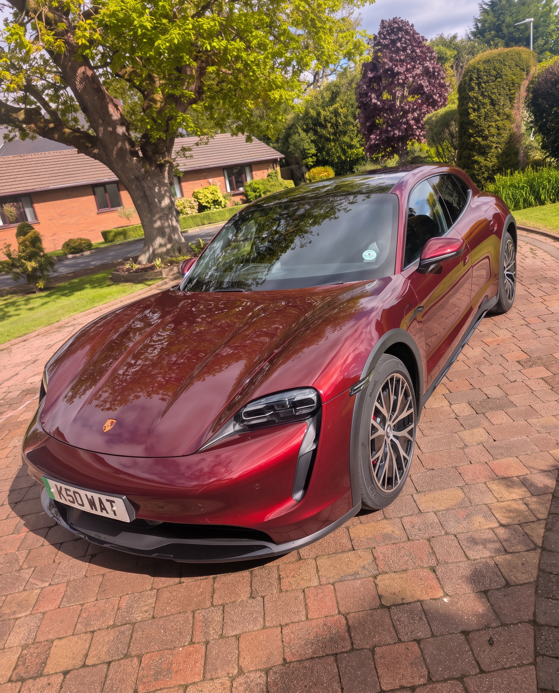 Red Porsche outside after detailing